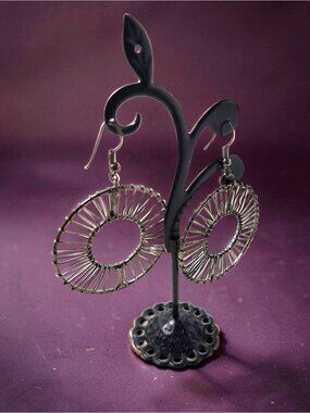 Vintage silver,gray toned wire-wrapped hoop dangle earrings featuring a sunburst